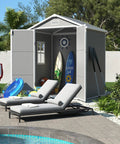 Outdoor Resin Storage Shed 6 By 4.5 Feet Lockable Plastic Garden Shed for bikes and tools, gray and white, in backyard setting