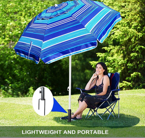 Woman relaxing under an umbrella secured with Adjustable Portable Umbrella Base With Heavy Duty Metal Holder Stand Auger