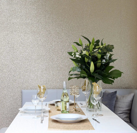 Gold Sequin Wallpaper Roll With Sparkle Finish For Living Rooms And Feature Walls Metallic Texture 20.5 Inches By 19.5 Feet Full Roll Glam Wall Decor That Turns Heads behind a dining table with flowers