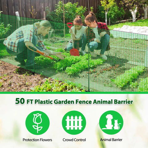 Garden with Easy Set Temporary Fence Kit With 3 Foot High 50 Foot Plastic Mesh and fiberglass step-in posts, protecting plants.