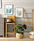 DIY Friendly Ink Lines Geometric Wall Stencil Set 2 Pack 17x39 Inches For Easy Accent Walls in a room with plants and framed prints.