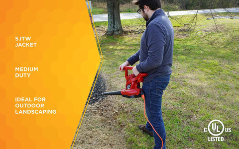 Man using bright orange outdoor extension cord built tough with weatherproof vinyl jacket for visibility and safety, 100 ft length