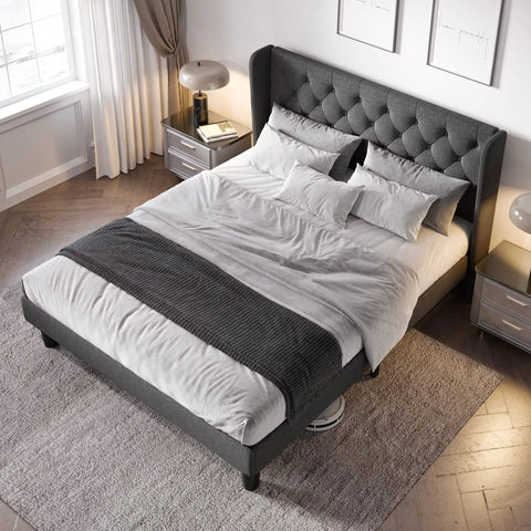 Modern Queen Bed Frame with Sturdy Button Tufted Wingback Headboard in Cool Dark Grey Upholstered Platform Setup with bedding.