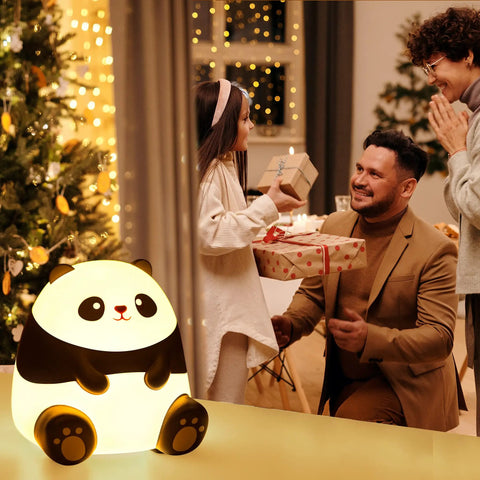 Panda Night Light For Kids With Cozy LED Glow Timer Auto Shutoff Battery Operated Silicone Animal Night Light beside family in holiday setting
