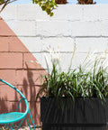 Long Planter For Porch Patio And Backyard In Durable Plastic Stone Composite Fluted All Weather Outdoor Pot with plants