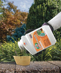 Liquid Copper Fungicide Concentrate For Organic Garden Disease Control 16 Oz being poured into measuring cup in garden