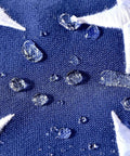 Close-up of water droplets on Outdoor 3x5 Foot American Flag Built Tough Deluxe Heavy Duty Spun Polyester Tear Resistant Waterproof All Weather High Wind USA Flag With Embroidered Stars Sewn Stripes Brass Grommets
