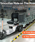 Awesome Heavy Duty Electric Tugger Cart With 2600 Lb Tow Power Perfect For Warehousing And Moving Gear With Ride On Seat For Tough Mobility Jobs with a ride-on seat and shock absorption system.