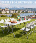 6 Foot Folding Table With Carrying Handle, Heavy Duty Steel Frame, 1.35 Inch Thick HDPE Top, Portable Picnic Setup in Park