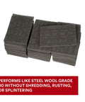 Stack of Ultra Fine Grade Hand Pad For Surface Prep And Finishing, Nonwoven Silicon Carbide, 6x9 in, Case of 60, gray color.
