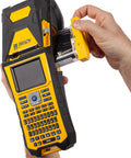Built Tough Portable Handheld Label Maker With Rechargeable Battery For Multi Line Wire Tagging And Panel Identification Includes Hard Shell Case Usb Charger And Pre Loaded Ribbon being loaded with a ribbon cartridge.