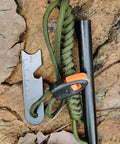 5 Inch Weatherproof Flint Ferro Rod Fire Starter Kit With Whistle And Paracord Lanyard Handle, Steel Multitool Striker on rock