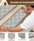 Person installing Non Slip Stair Treads For Wooden Steps 9 By 28 Inches Peel And Stick Indoor Runner For Kids Elders And Dogs Grey 4 Pack