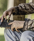 Man loading Butt Stock Rifle Shell Holder For Grab And Go Quick Access Pouch, Fits Snugly Around Rifle Butt, Holds 9 Cartridges