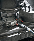 Heavy Duty Half Inch Drive Pneumatic Air Impact Wrench Delivers Over 1100 Ft Lbs Of Bone Crushing Torque on workshop table