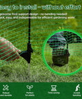 Movable Temporary Fence With Posts 3 Ft By 50 Ft Plastic Mesh Safety Barrier For Dogs And Pets being installed with foot support and peg on grass
