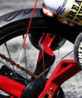 Applying Heavy Duty Breakaway Penetrating Oil For Loosening Rusted Joints And Bolts to a rusted bicycle chain and wheel