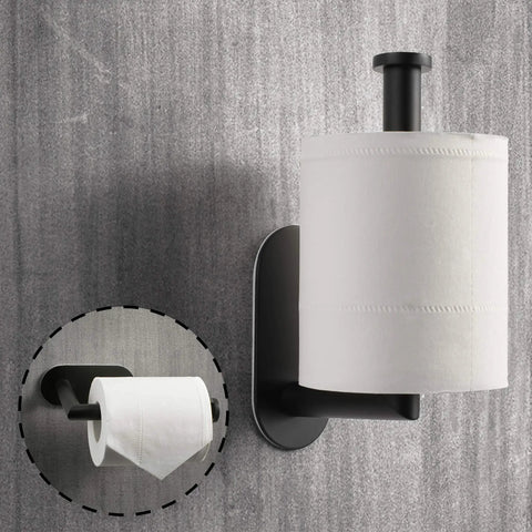 Matte black stainless steel toilet paper holder with adhesive mount, vertical installation, shown holding a roll, modern bathroom accessory.