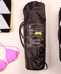 Lightweight 7x7 Foot Beach Tent Sun Shelter With Sand Anchors bag next to suitcase and beach items