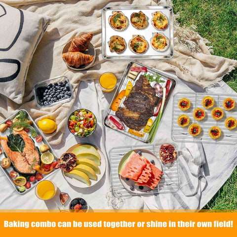 Picnic setup with food on stainless steel quarter sheet pans and wire racks, showcasing their use for roasting, baking, and serving.