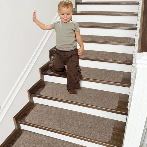 Child walking on wooden steps with Non Slip Stair Treads Carpet Mats 28 By 9 Inches Indoor Stair Runners For Wooden Steps Teal 10 Pack