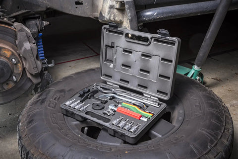15 Piece Brake Service Set For Disc And Drum Brakes With Heavy Duty Spreader Shoe Return Spring Remover Pad Installer And Color Coded Brake Lining Thickness Gauge inside open case on tire