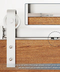 Two Pack Stainless Steel Barn Door Soft Close Mechanism For Flat Track With Adjustable Weight Up To 160 Pounds Universal Compatibility Hole Free Installation Or Drilled Track Optional Effortless Smooth Opening And Closing Silver, installed view on wood door.