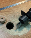 Heavy Duty Wood Hole Saw Kit, 16 Piece Set, cutting hole in wood with mandrel attached, circular cutout beside it, for PVC etc.