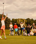 Group of golfers celebrating on course with bags, featuring Dope Fairway Wood Headcover With Style And Flare, Premium Golf Club Cover.