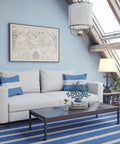 Living room with nautical decor, white sofa, striped rug, and Aweigh Table Lamp With Weathered Bronze Finish For Coastal Casual Living Rooms.