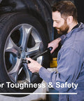 Mechanic uses One Half Inch Drive Dual Direction Click Torque Wrench Pro Grade Tool, 15 To 150 Ft-Lb Range on car wheel