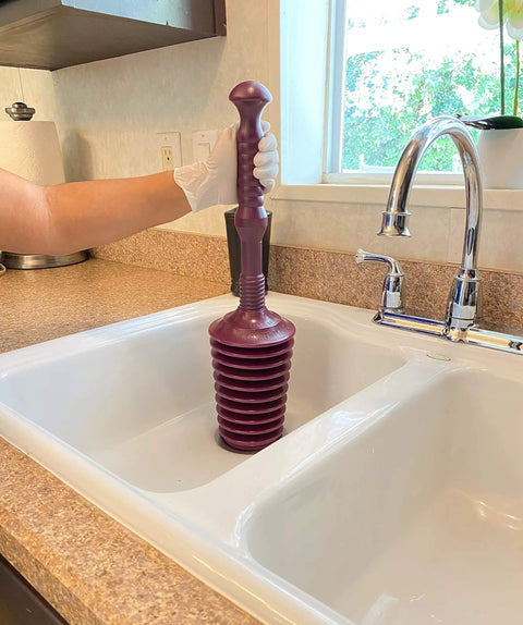 Heavy Duty All Purpose Plunger With Smart Air Release Valve And Eight Cup Capacity For Knocking Out Nasty Clogs In Toilets Kitchen Sinks Bathtubs And Garbage Disposals Top Shelf Plumbing Tool in a kitchen sink.