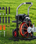 450W Auto Feed Drain Auger with 100 Ft Steel Cable, includes gloves and cutters, on grass background.