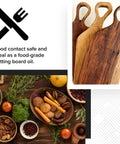 Top Shelf Dark Tung Oil Wood Finish Blended With Citrus Orange Peel Oil For Cutting Boards And Butcher Blocks Food Grade Matte Sealant No Sweat Application Badass Long Lasting Protection 32 Oz Container on wooden cutting boards.