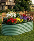 Yard Ready 8x4x1.5ft Galvanized Raised Garden Bed With 18 Inch Deep Root Zone Anti Cut Safety Edges Rust Resistant Oval Planter Box 359 Gallons For Outdoor Vegetables Flowers And Herbs shown in a backyard with flowers.