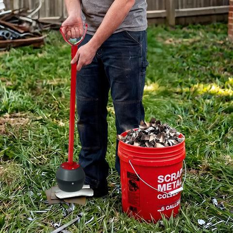 Person using Magnetic Pickup Tool With 25lb Pull 27.5 Inch Reach Quick Release Handle to collect metal scraps outdoors