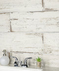 Bathroom sink with Retro Blanc Porcelain Tile 8.25x23.5 Inch for floor and wall, glazed medium textured finish with low sheen.