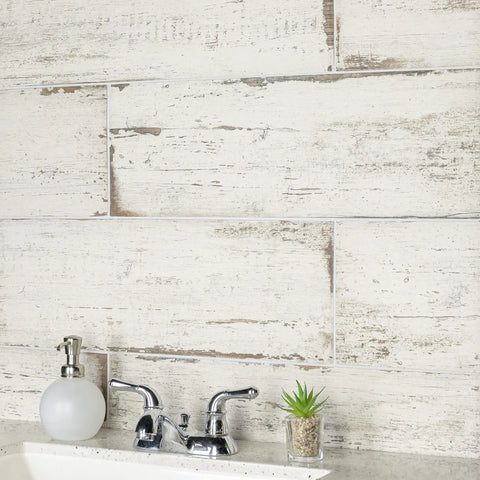 Bathroom sink with Retro Blanc Porcelain Tile 8.25x23.5 Inch for floor and wall, glazed medium textured finish with low sheen.