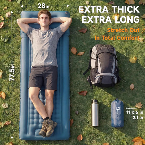 Man lying on Ultralight Camping Sleeping Pad With Built In Pillow And Foot Pump 5 Inch Thick Inflatable Mat for outdoors.
