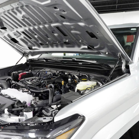 Open hood of Toyota Tacoma with Hood QuickLIFT System For Toyota Tacoma And 4Runner Slick Prop Rod Eliminator Clean Engine Bay