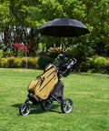Hardcore Lightweight Foldable Golf Push Cart With Zero Hassle Quick Release Frame And Smooth 360 Rotating Front Wheel Adjustable Handle with umbrella and golf bag on grass.