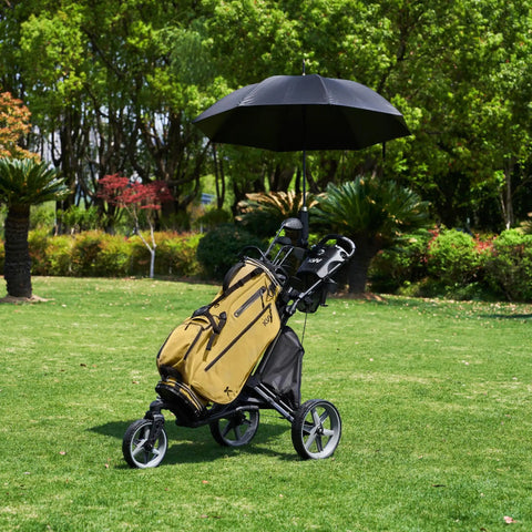 Hardcore Lightweight Foldable Golf Push Cart With Zero Hassle Quick Release Frame And Smooth 360 Rotating Front Wheel Adjustable Handle with umbrella and golf bag on grass.