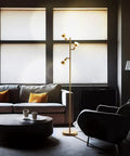 Ash 3-Head LED Tree Floor Lamp With Dimmable Lights, Multidirectional Swivel Heads, Antique Brass Finish in cozy living room