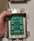 Built Tough Stainless Steel Junction Box For 4 Load Cells With IP67 Waterproof Case, open view showing green circuit board.