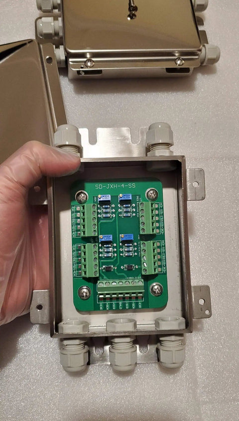 Built Tough Stainless Steel Junction Box For 4 Load Cells With IP67 Waterproof Case, open view showing green circuit board.