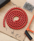 Red 78 Inch Router Edge Guide Templates Kit With Flexible Curve Ruler And 150 Self Tapping Screws on a wooden board