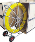 Heavy Duty Fiberglass Fish Tape Built Dang Solid For Hella Smooth Wire Routing And Conduit Pulling With Sturdy Wood Reel And Wheeled Cart 12mm 820Ft Length To Route Cables Anywhere Fast, yellow tape on metal cart.