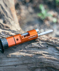 Stash Bike Chain Tool Kit With Hidden Handlebar Storage For Quick On The Go Repairs, showing orange tool on wood surface