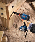 Two-In-One 18V Impact Driver Kit With 1/4 Inch Quick-Change Hex And 1/2 Inch Drive in use on wooden beams outdoors