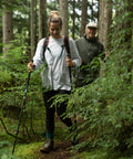 Hikers using Lightweight Aircraft Grade Aluminum Trekking Poles With Extended Down Grip on a wooded trail